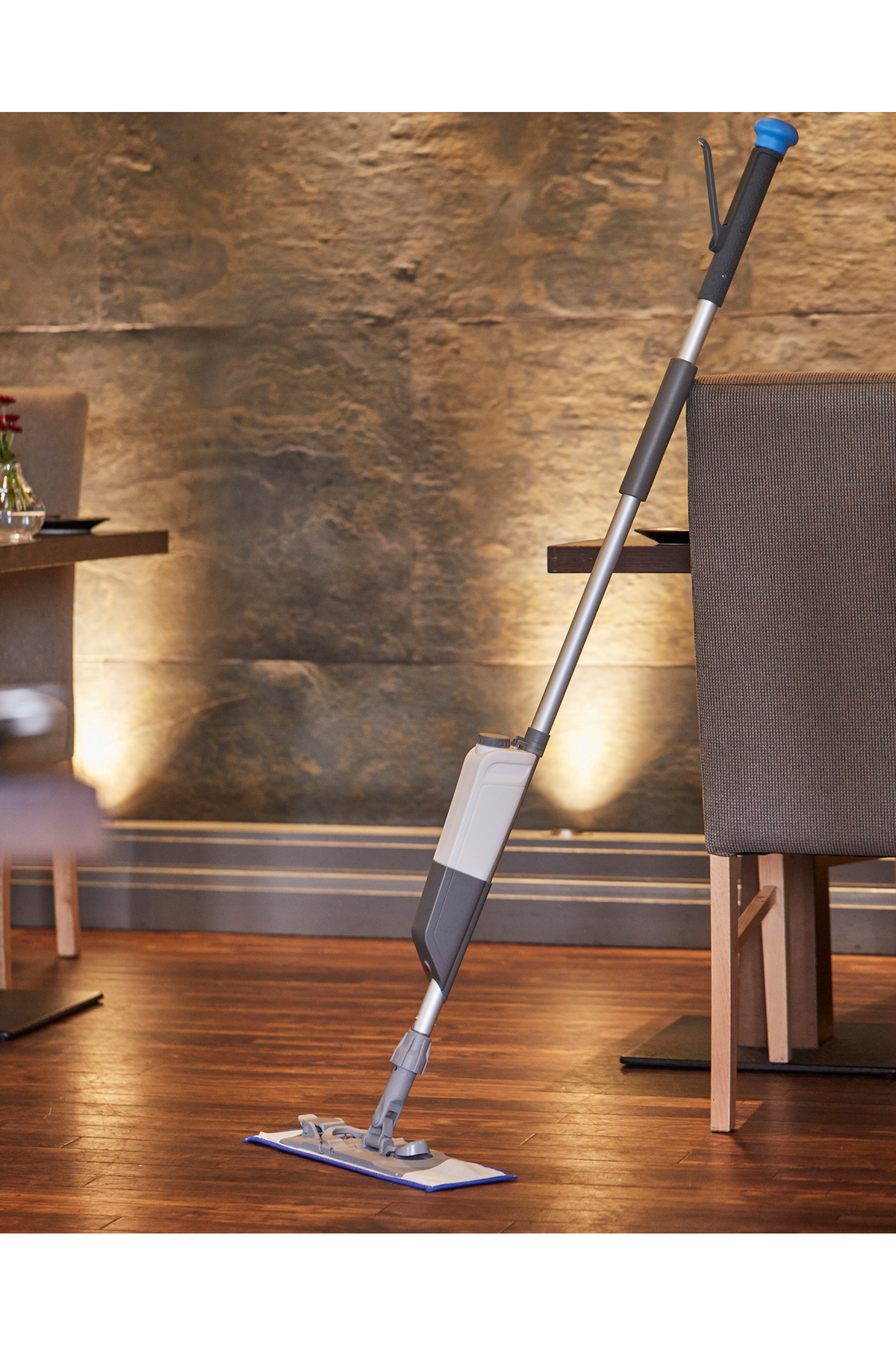 Pro-mist Microfibre Antibacterial Mop Kit in a restaurant setting for efficient floor cleaning.